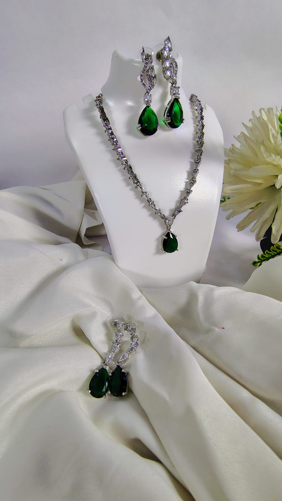 Wincham Fashion House American diamond jewelry set with green stone featuring necklace and earrings