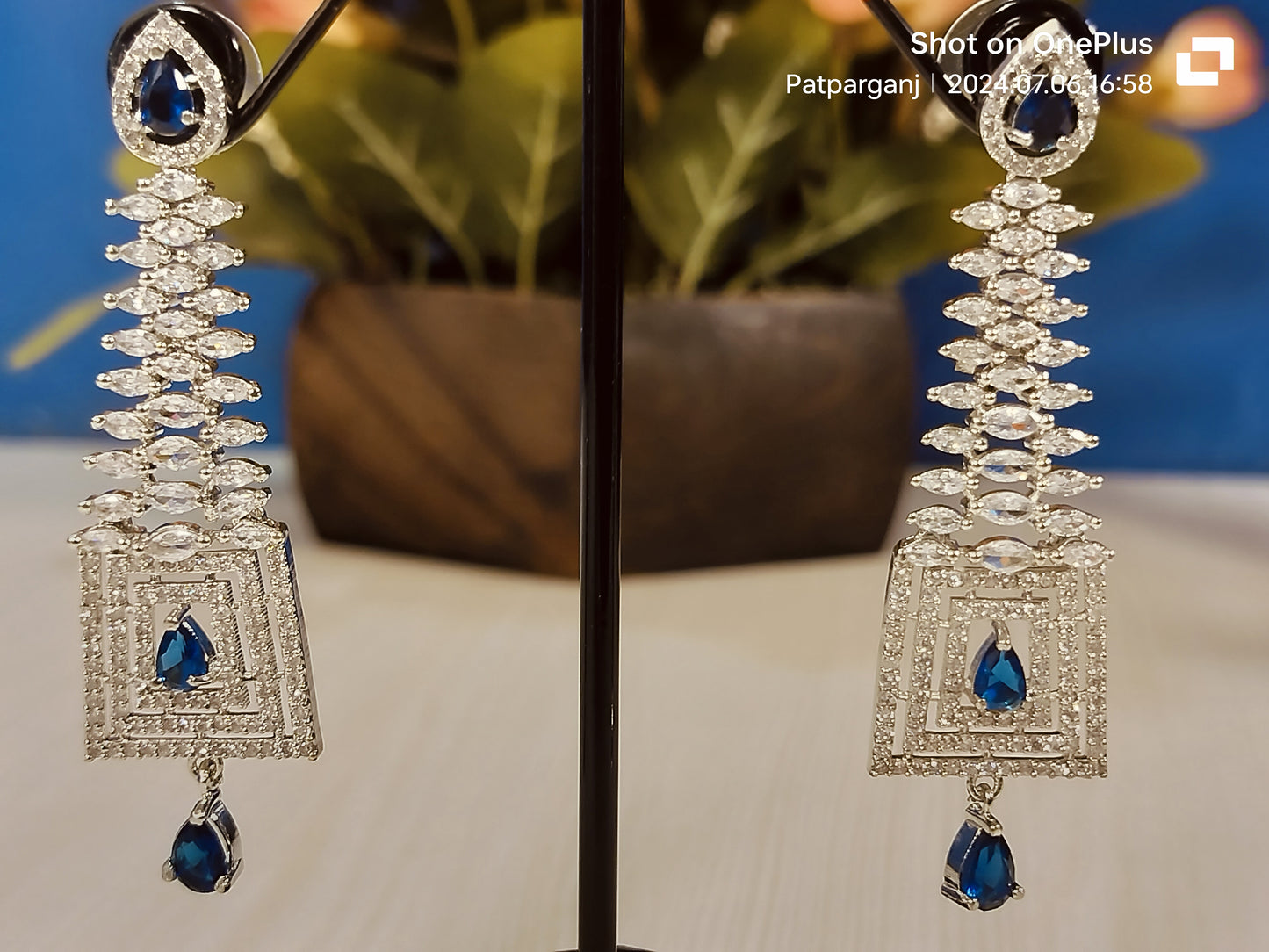 Wincham Fashion House Blue stone dangle Ad earrings for Party with silver detailing and intricate design