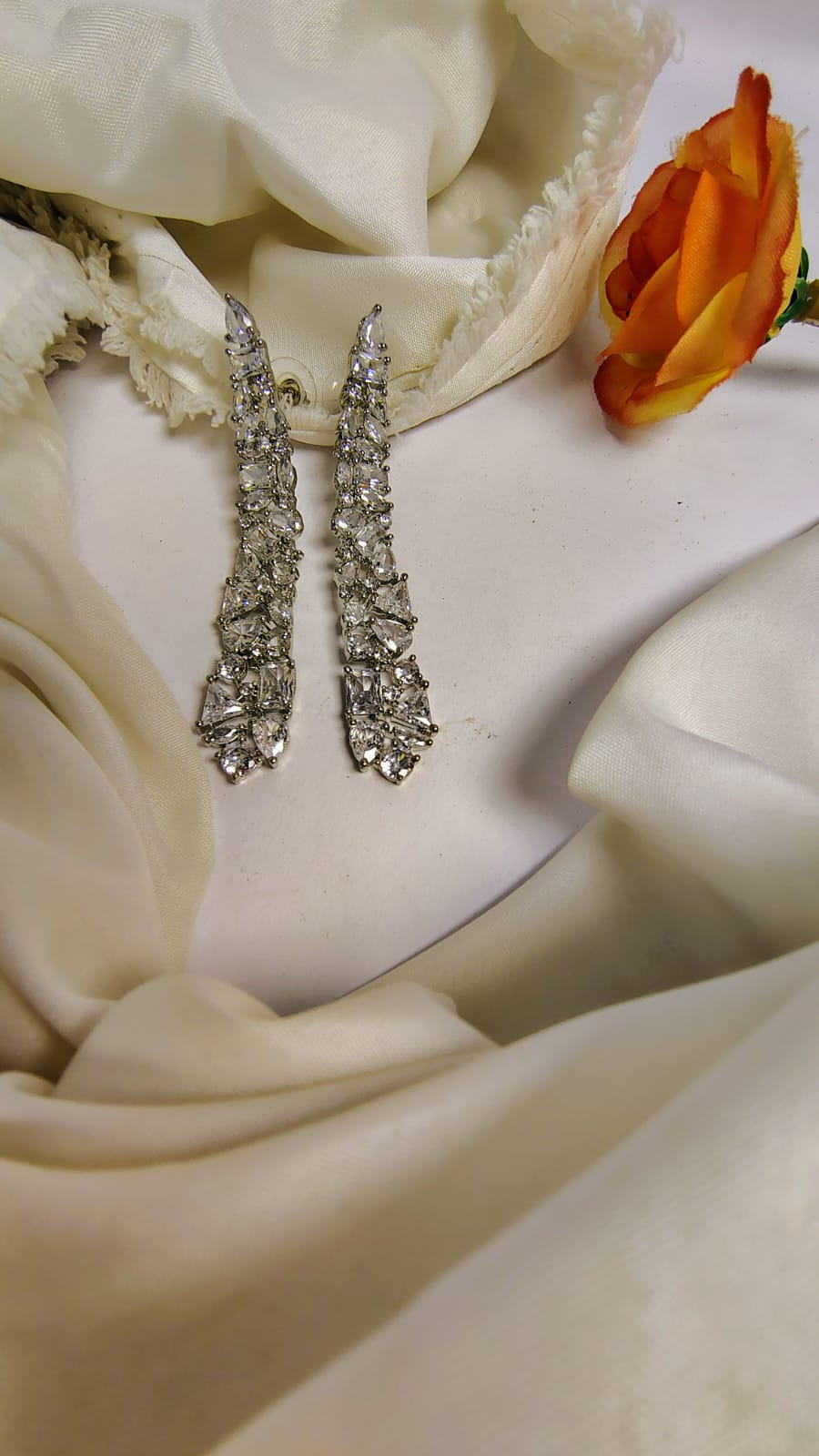 Wincham Fashion House designer American diamond dangle earrings with intricate sparkling design