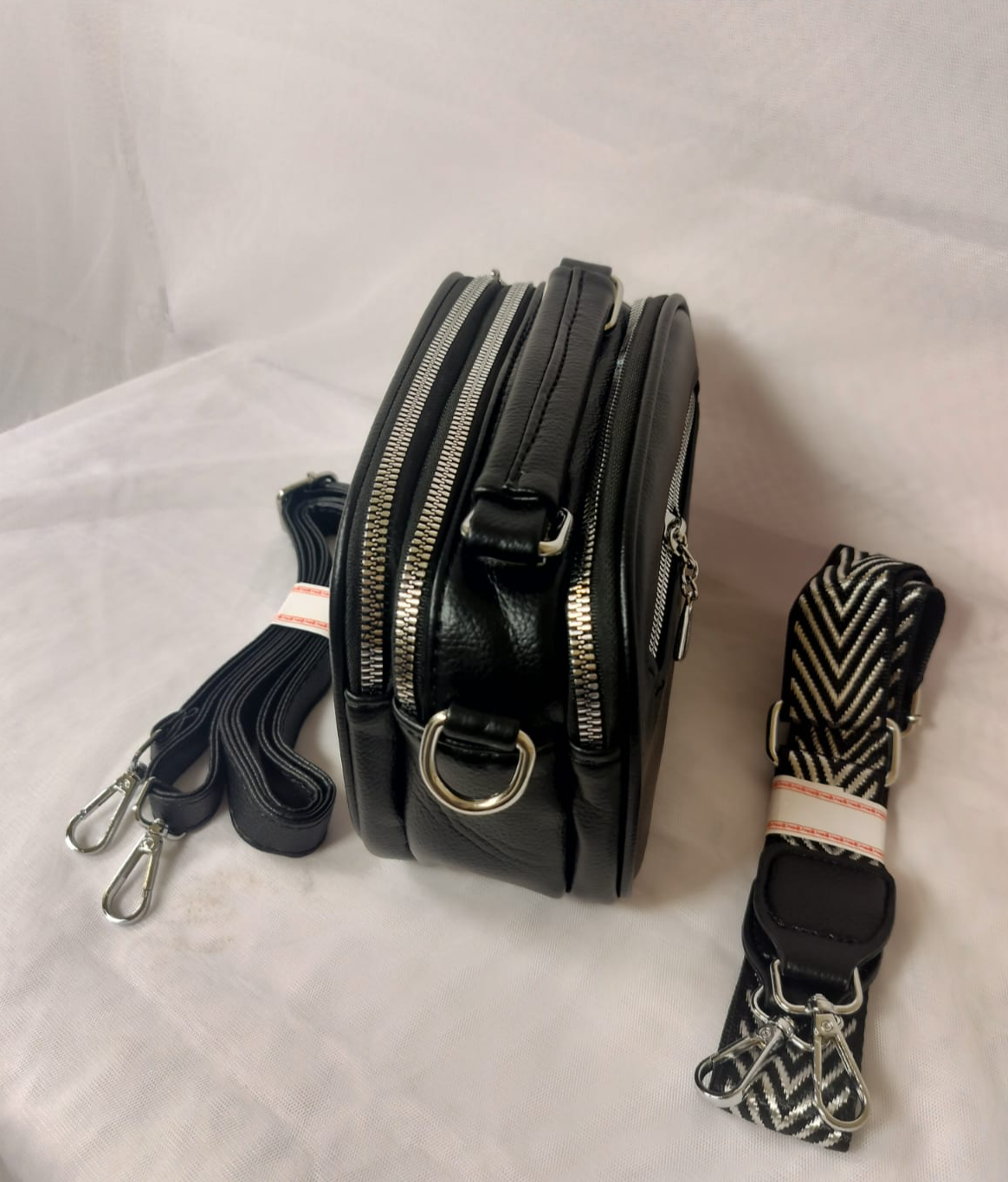 Wincham Fashion House designer black purse for women with multiple zip compartments and two detachable straps