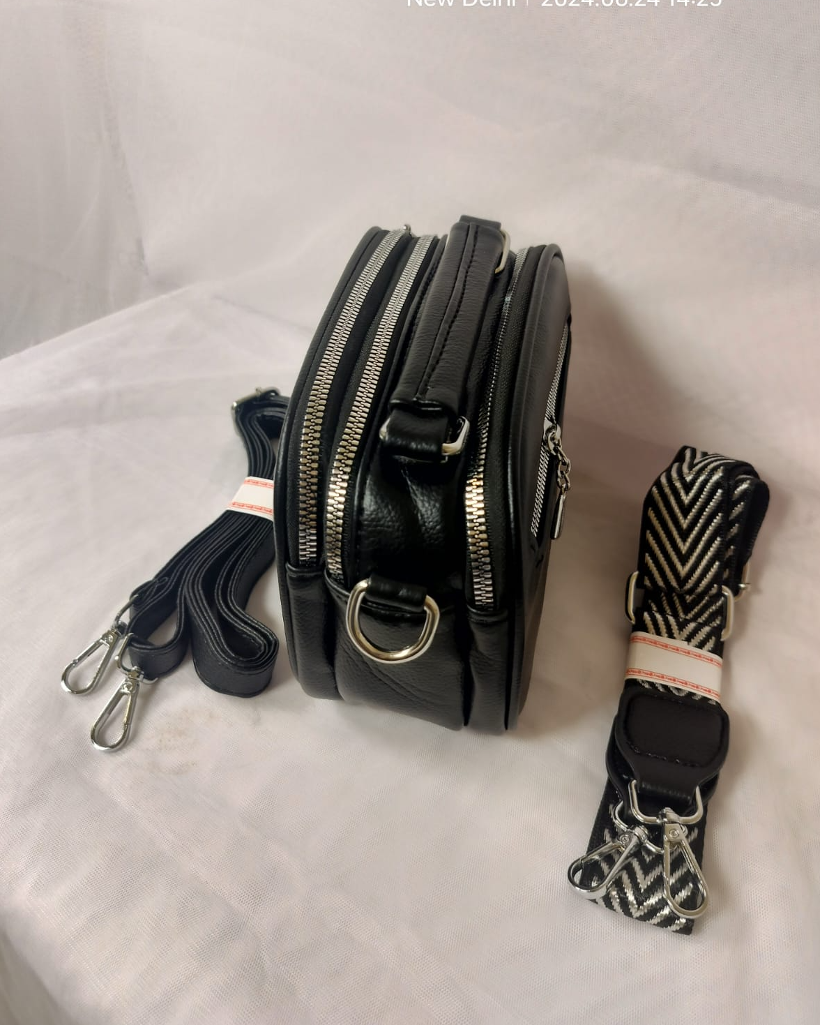 Designer black purse for women by Wincham Fashion House with multiple compartments and detachable straps