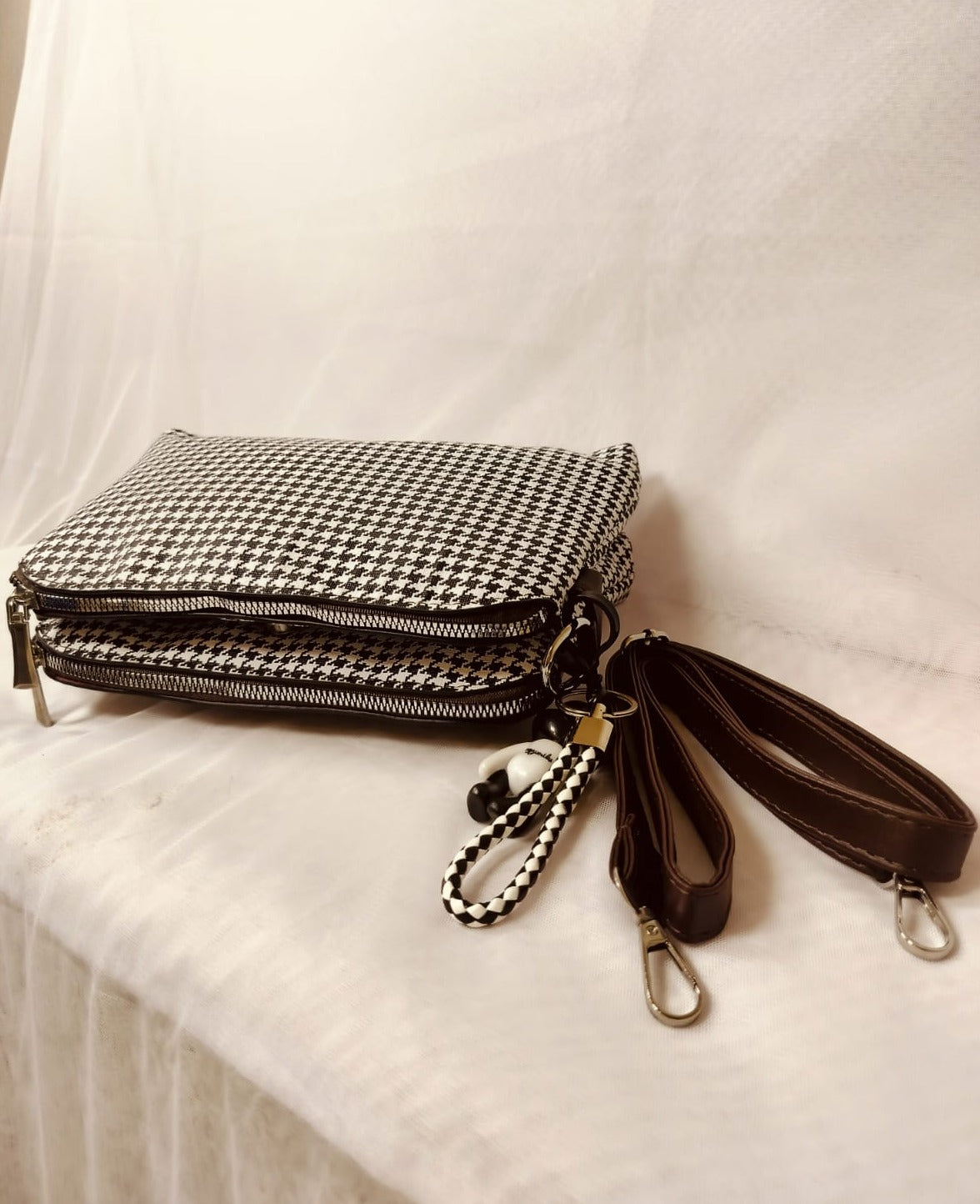 Small designer evening bag check with black and white pattern and detachable strap