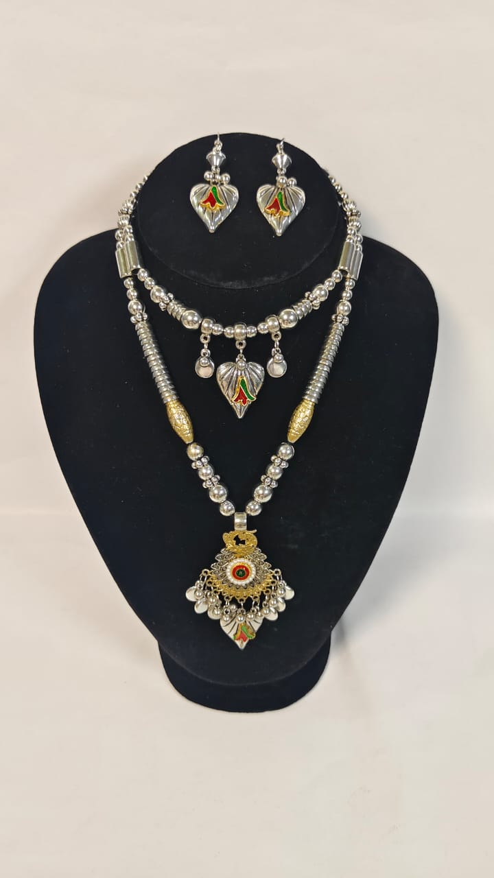 Wincham Fashion House dual necklace set silver and gold with matching earrings featuring intricate designs