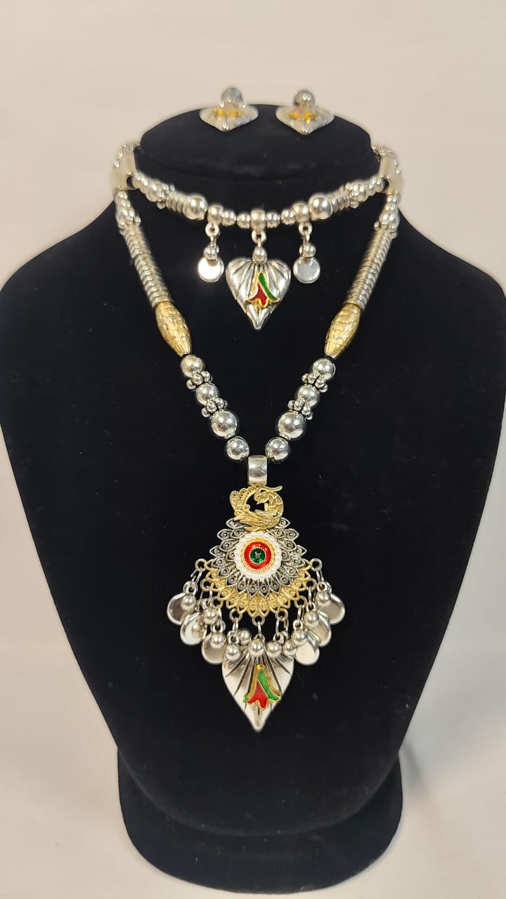 Dual necklace set silver and gold with decorative pendant and matching earrings