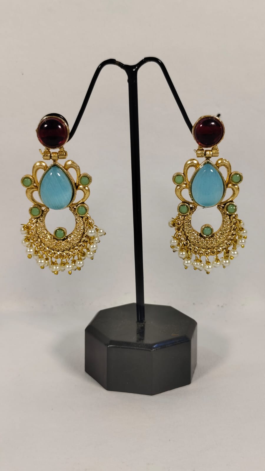 Elegant Wincham Fashion House fancy party wear earrings with blue stones and gold detailing