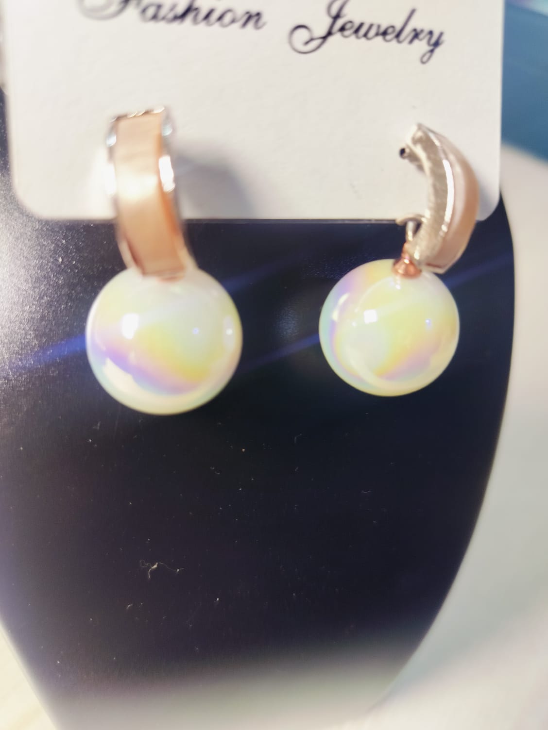 Wincham Fashion House golden pearl earrings with iridescent round pearls and gold-tone hoop design