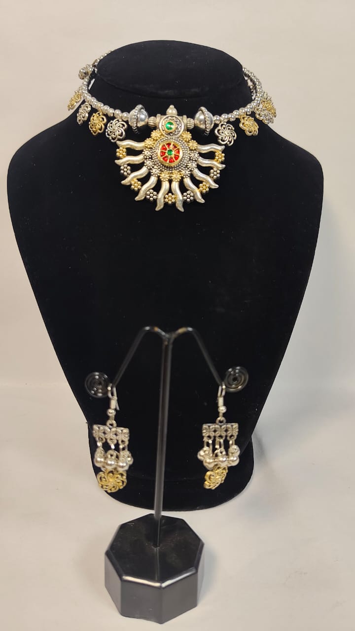 Elegant German silver necklace set featuring intricate designs with matching earrings for a stylish look