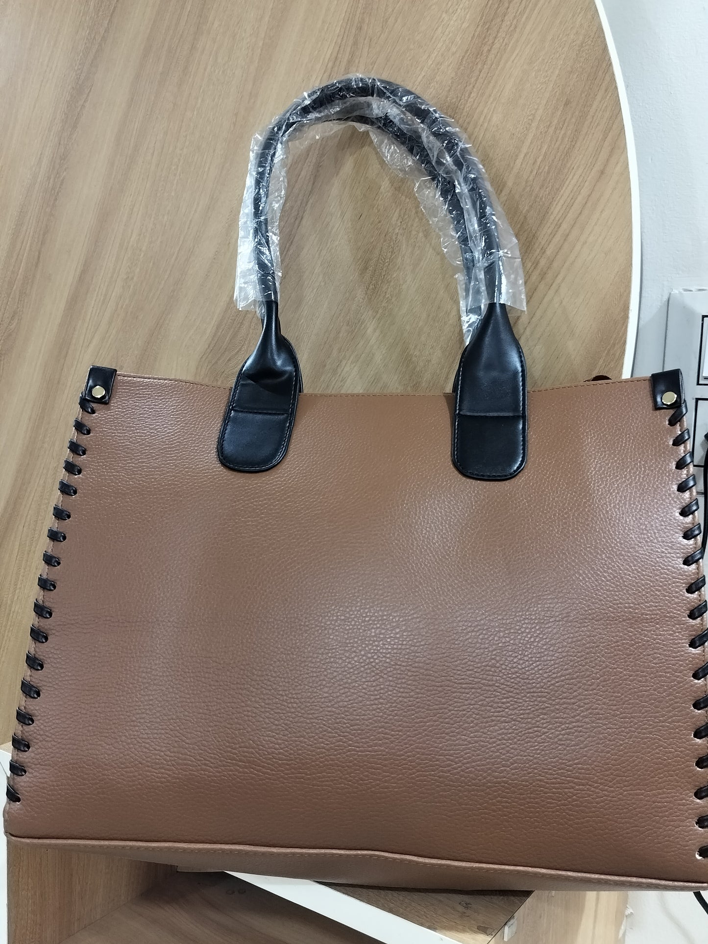 Wincham Fashion House handmade leather laptop tote in brown with black handles and stitched detailing