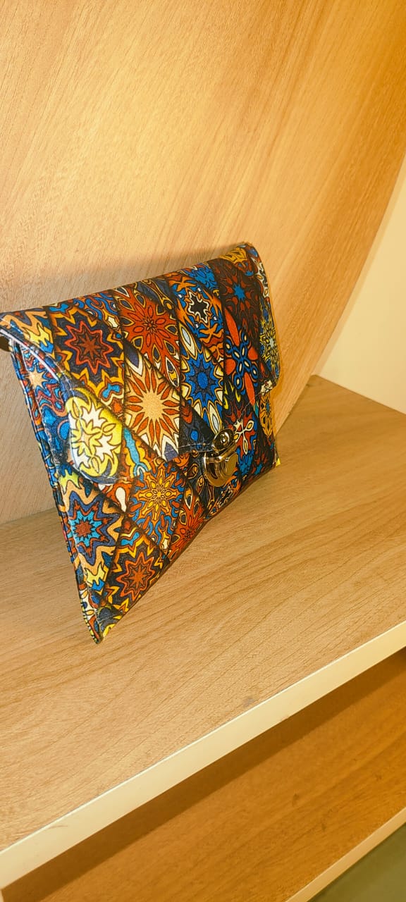 Wincham Fashion House multicolor hand purse with intricate floral and geometric patterns