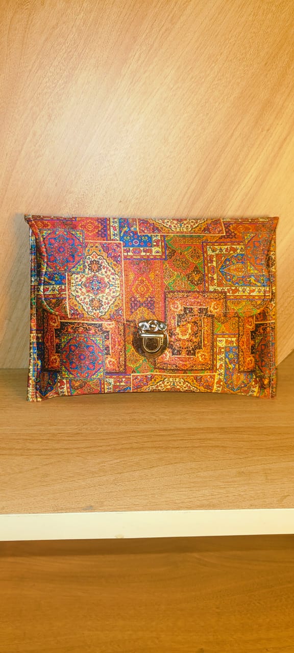 Wincham Fashion House multicolor hand purse with intricate patchwork design and metal clasp