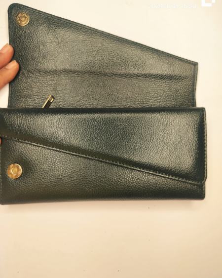 olive green leather wallet showing textured front and gold snap buttons