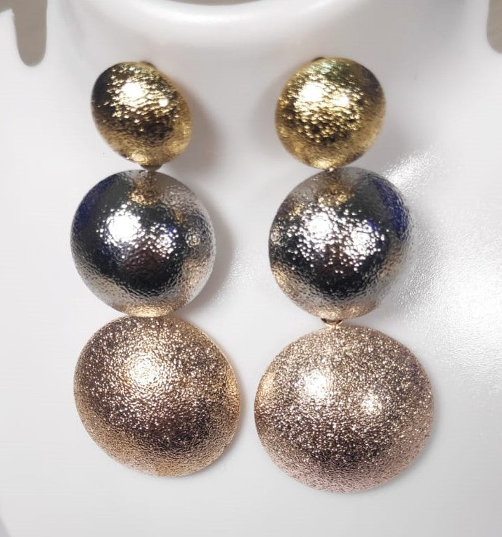 Triple disc rose gold and silver earrings from Wincham Fashion House featuring textured metallic finish