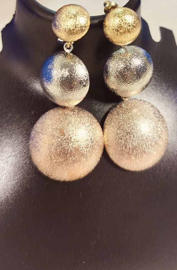 Wincham Fashion House rose gold and silver earrings with textured triple circle design