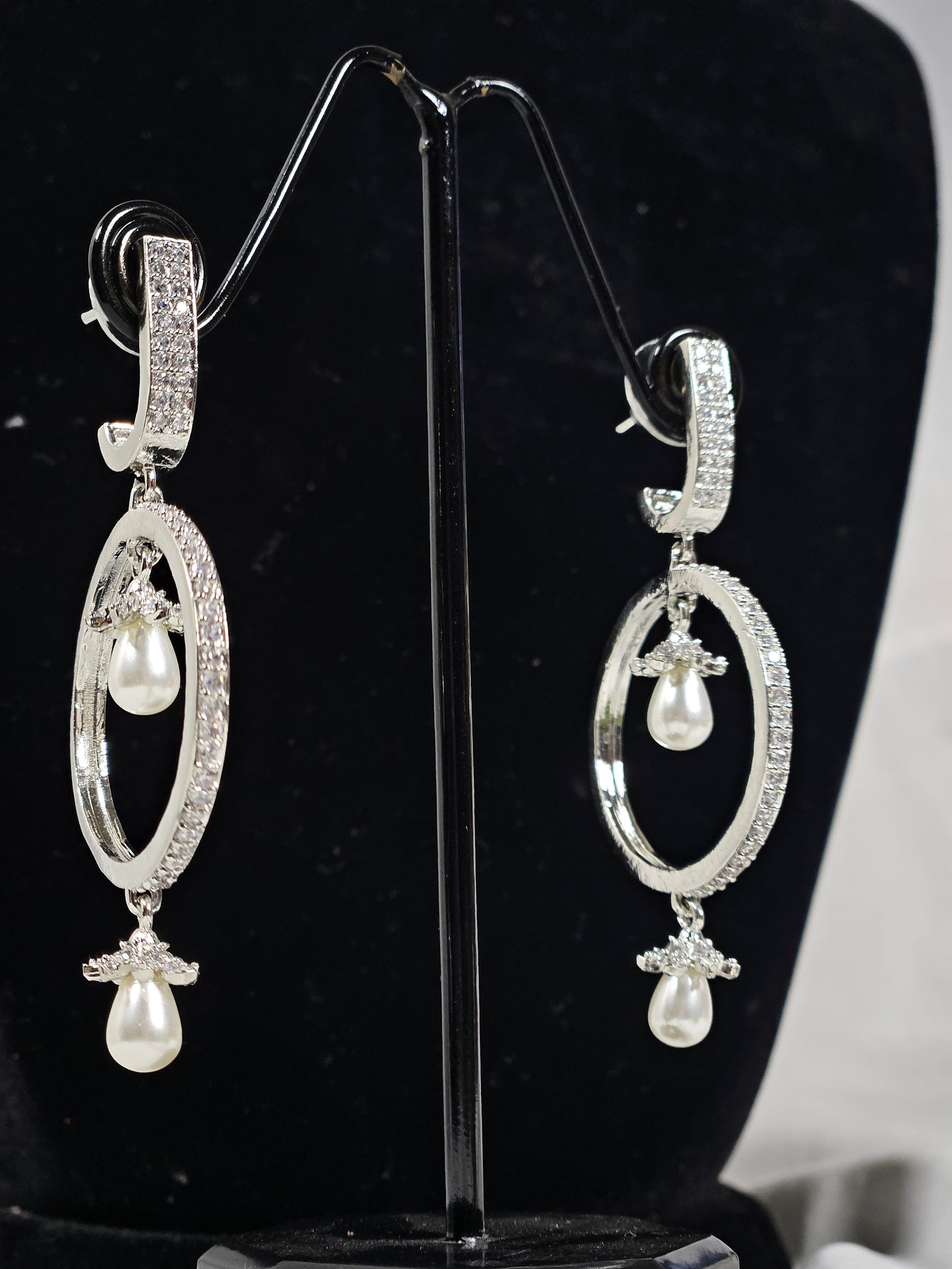 Wincham Fashion House round drop AD earrings with pearls featuring silver oval hoops and dangling pearl accents