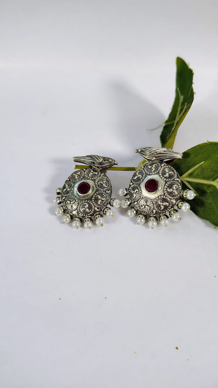 Wincham Fashion House silver alloy mangalsutra set featuring intricate peacock design and pearl accents