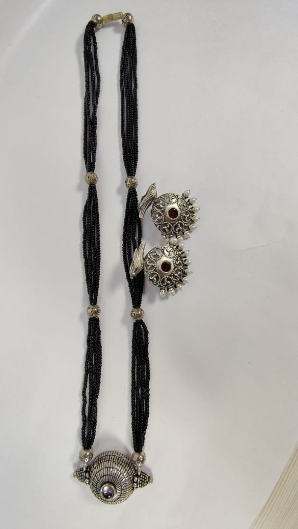 Wincham Fashion House silver alloy mangalsutra set with black beads and intricate pendant with matching earrings