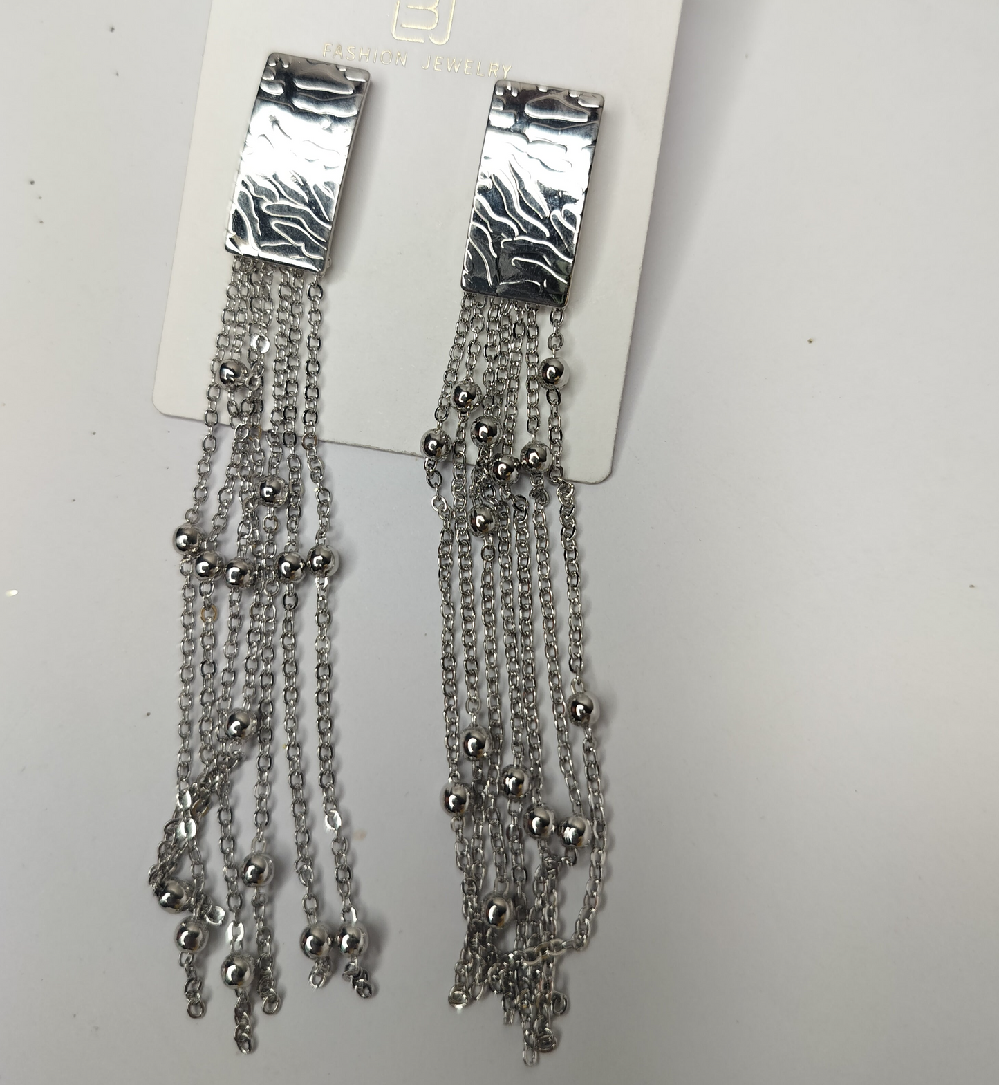 Stylish silver earrings for women featuring multiple dangling chains with small silver beads