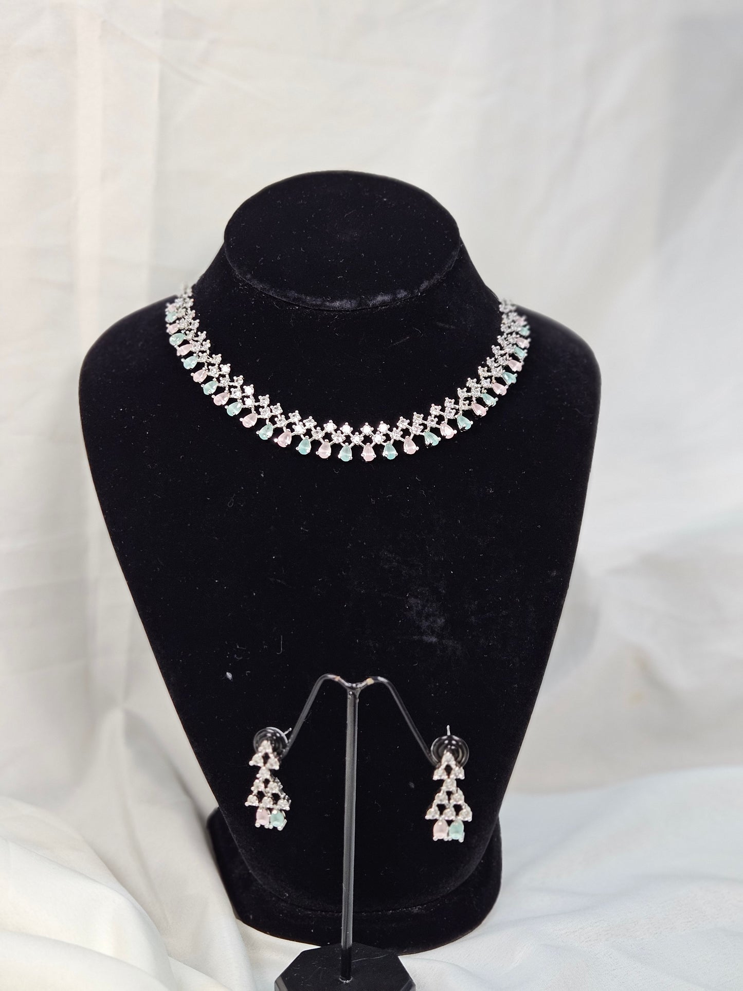 Wincham Fashion House American diamond necklace set with matching earrings displayed