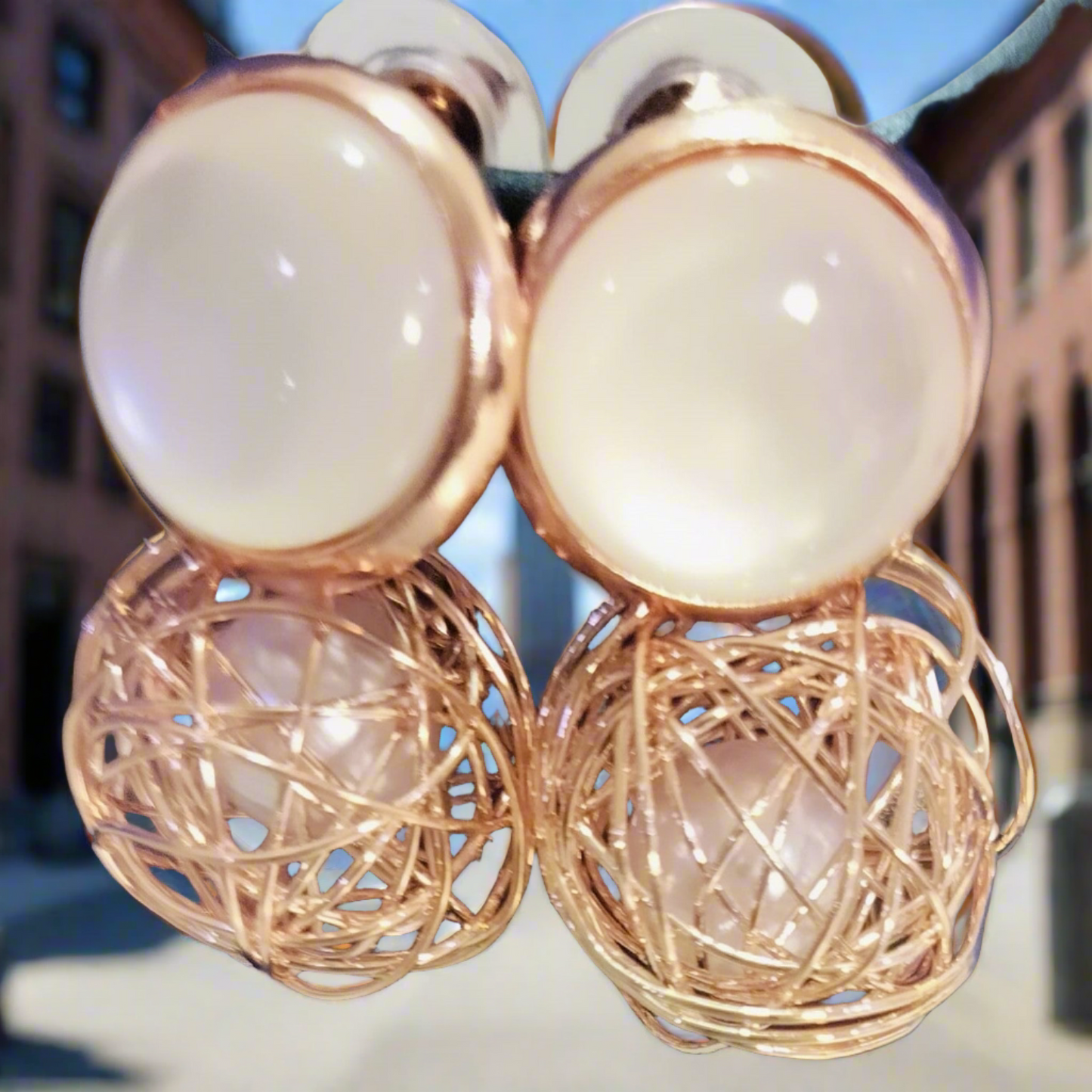 Wincham Fashion House Korean pearl gold earrings with intricate wire design and glossy pearl tops