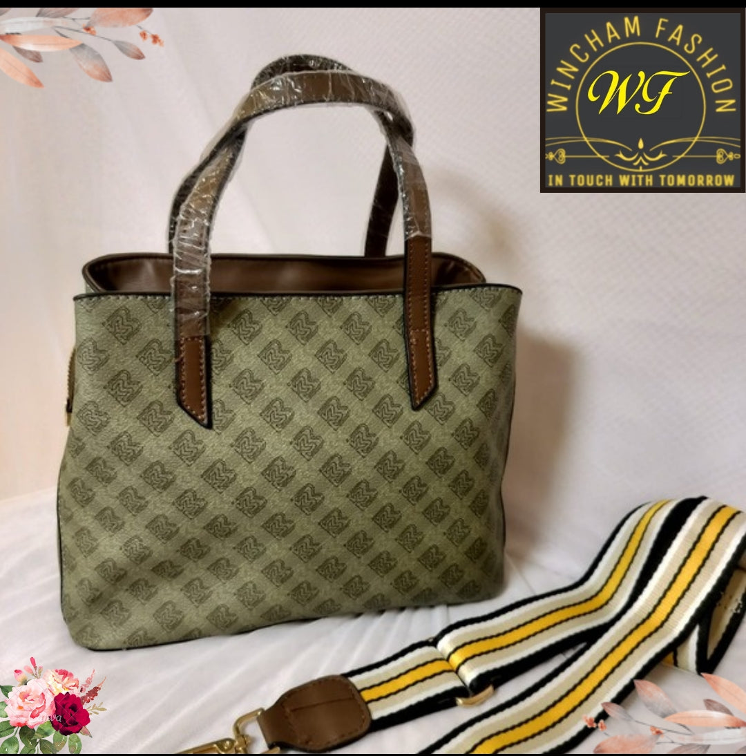Green shoulder bag for women with patterned fabric and brown handles from My Store
