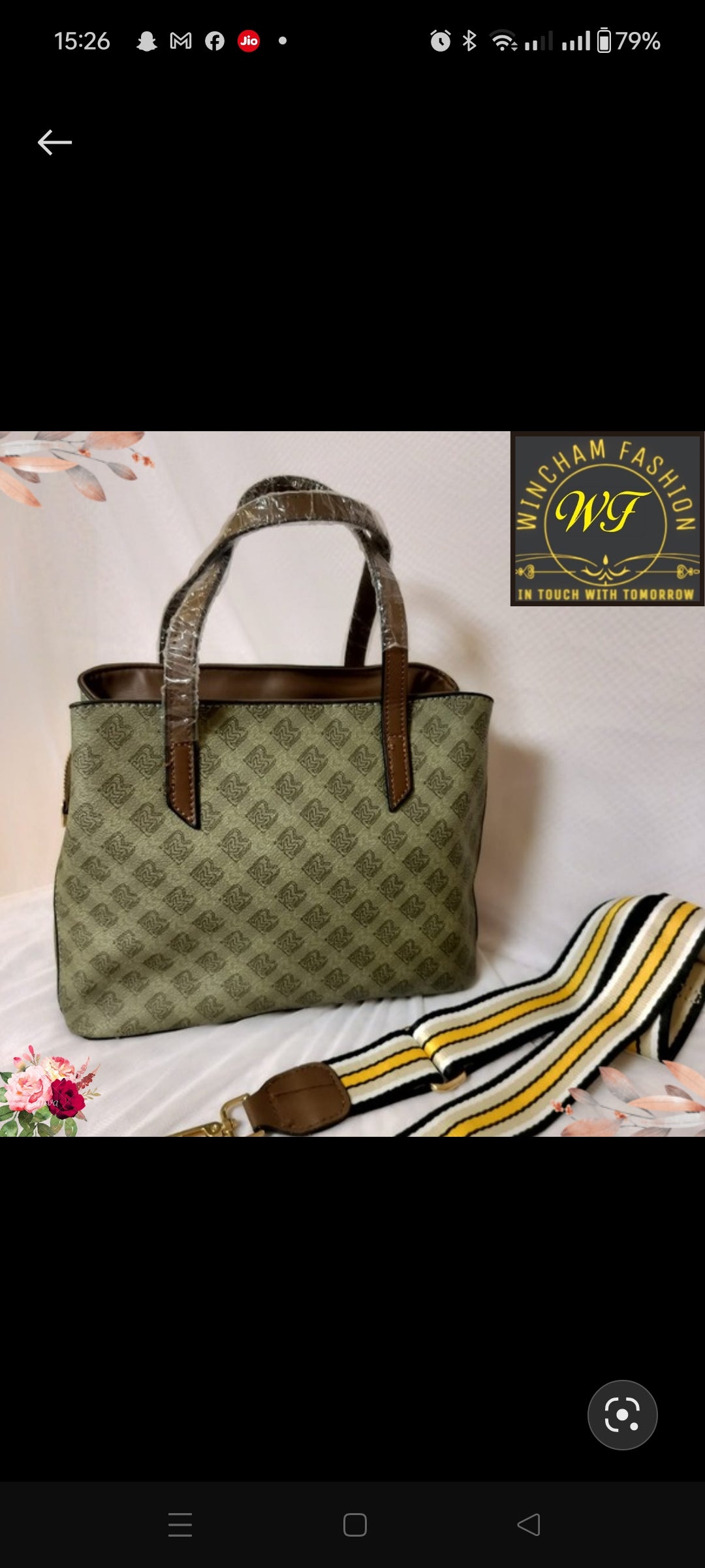 Green shoulder bag for women with patterned fabric and brown handles displayed on white background