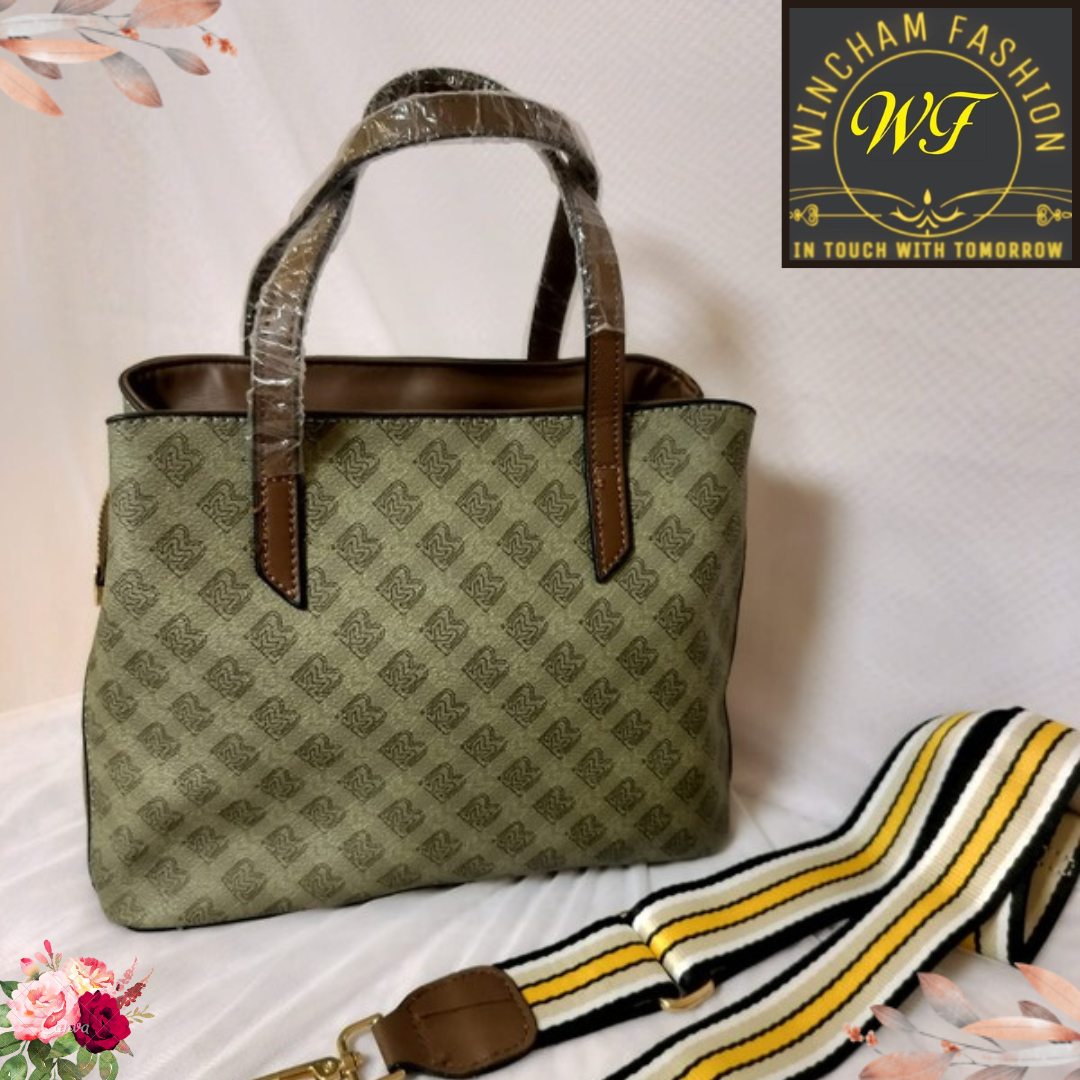 Green shoulder bag for women with brown handles and patterned fabric