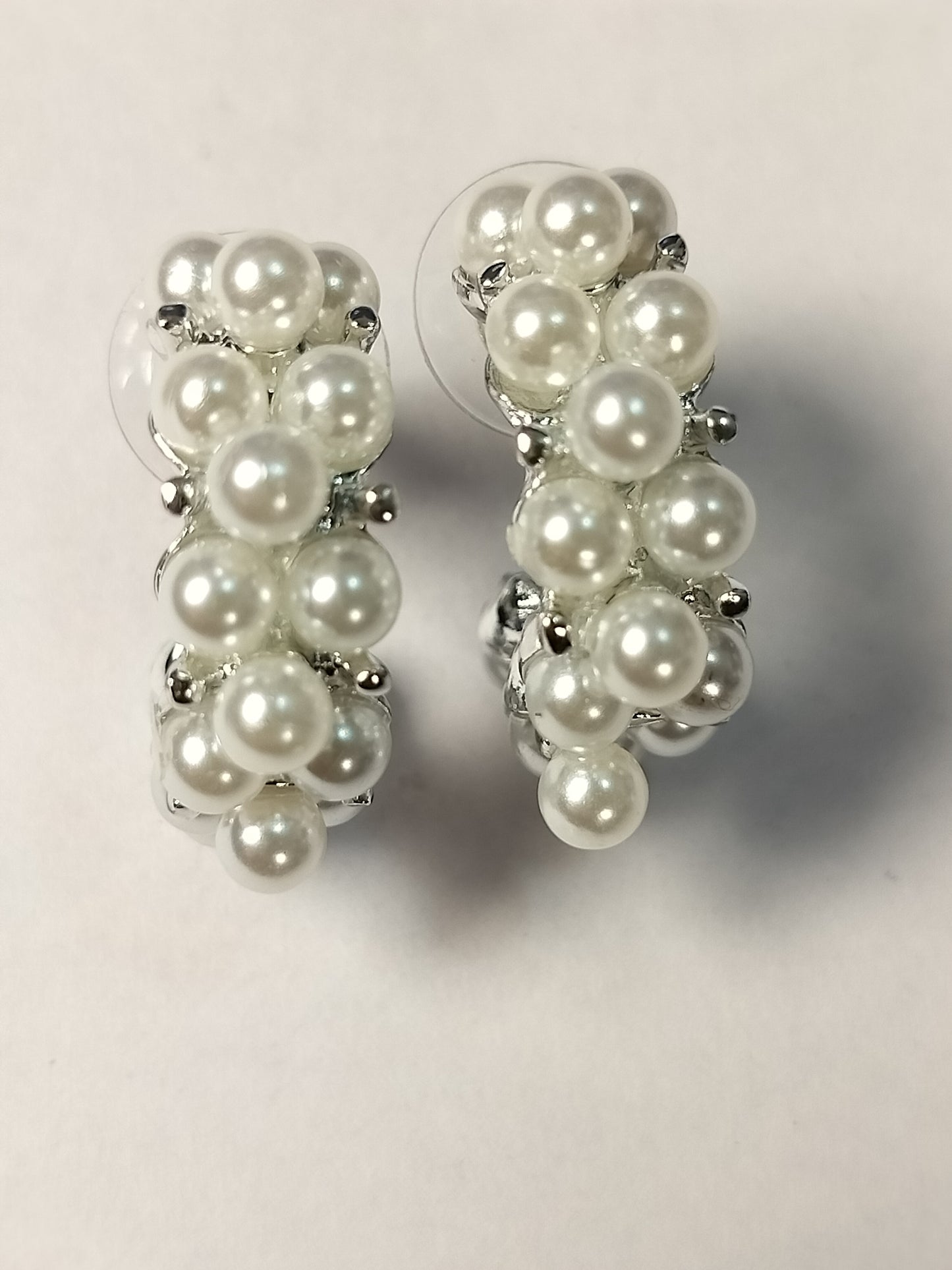Wincham Fashion House pearl hoop earrings featuring clustered white pearls on silver hoops