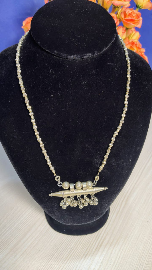 Wincham Fashion House alloy silver pendant necklace with decorative beads and unique pendant design