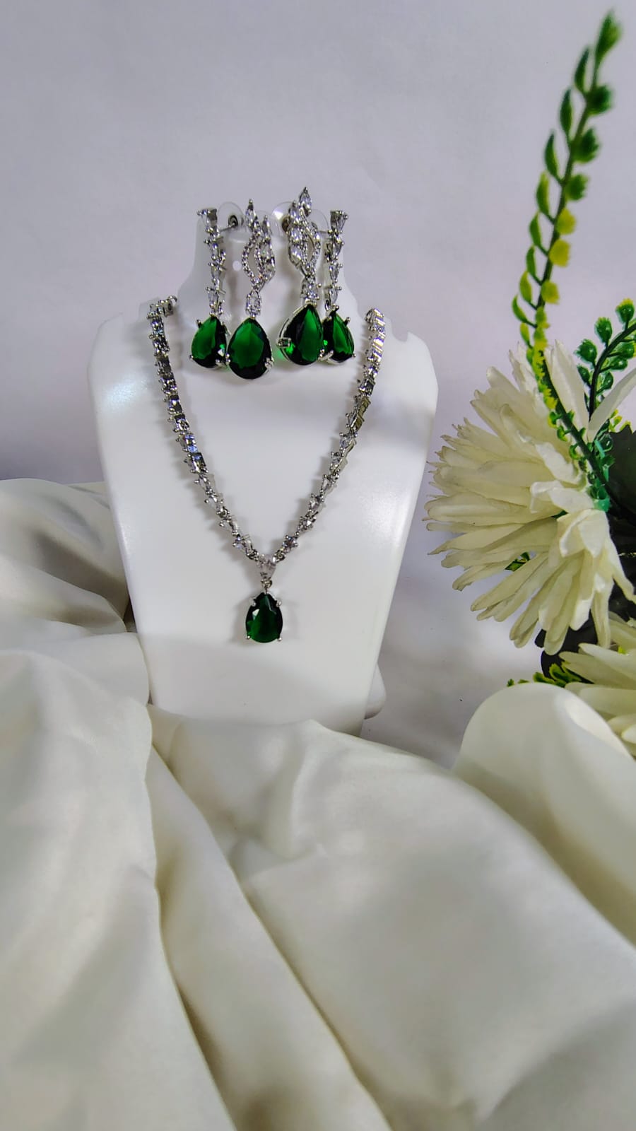 American diamond jewelry set with green stone featuring necklace and matching earrings by Wincham Fashion House