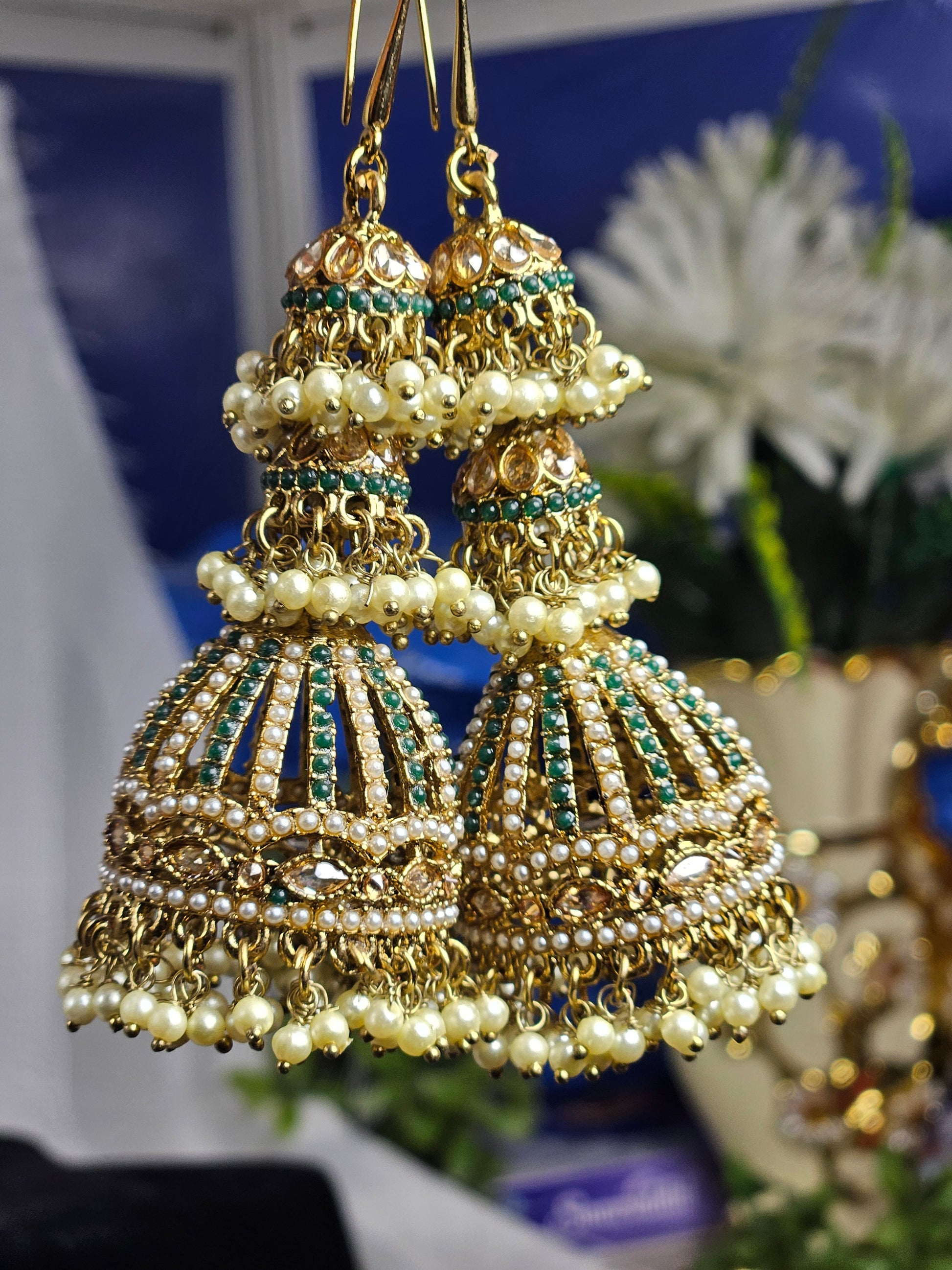 Wincham Fashion House American diamond jhumka earrings with polki featuring intricate gold and pearl design