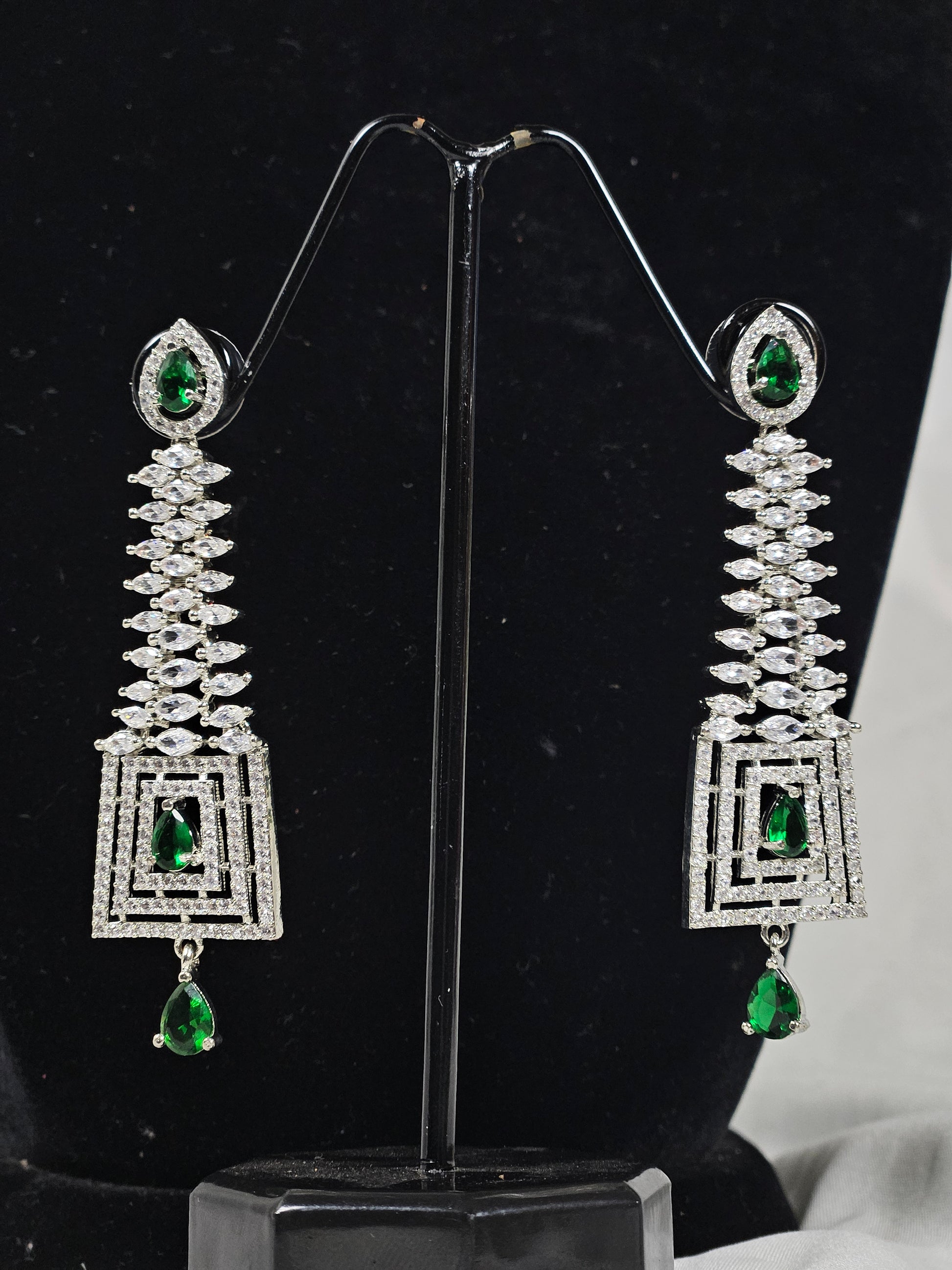 Wincham Fashion House elegant blue stone dangle Ad earrings for Party with intricate silver design