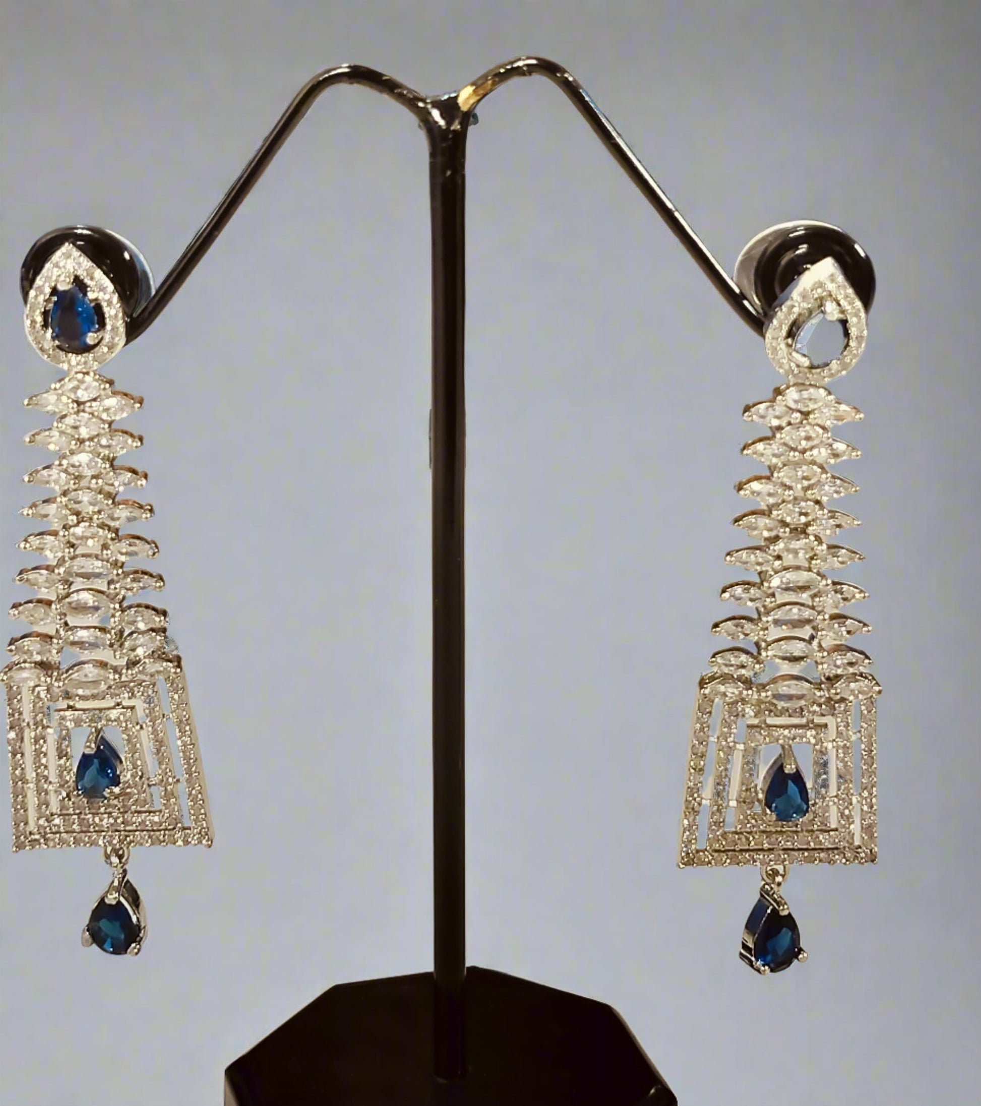 Blue stone dangle Ad earrings for Party with intricate silver design by Wincham Fashion House