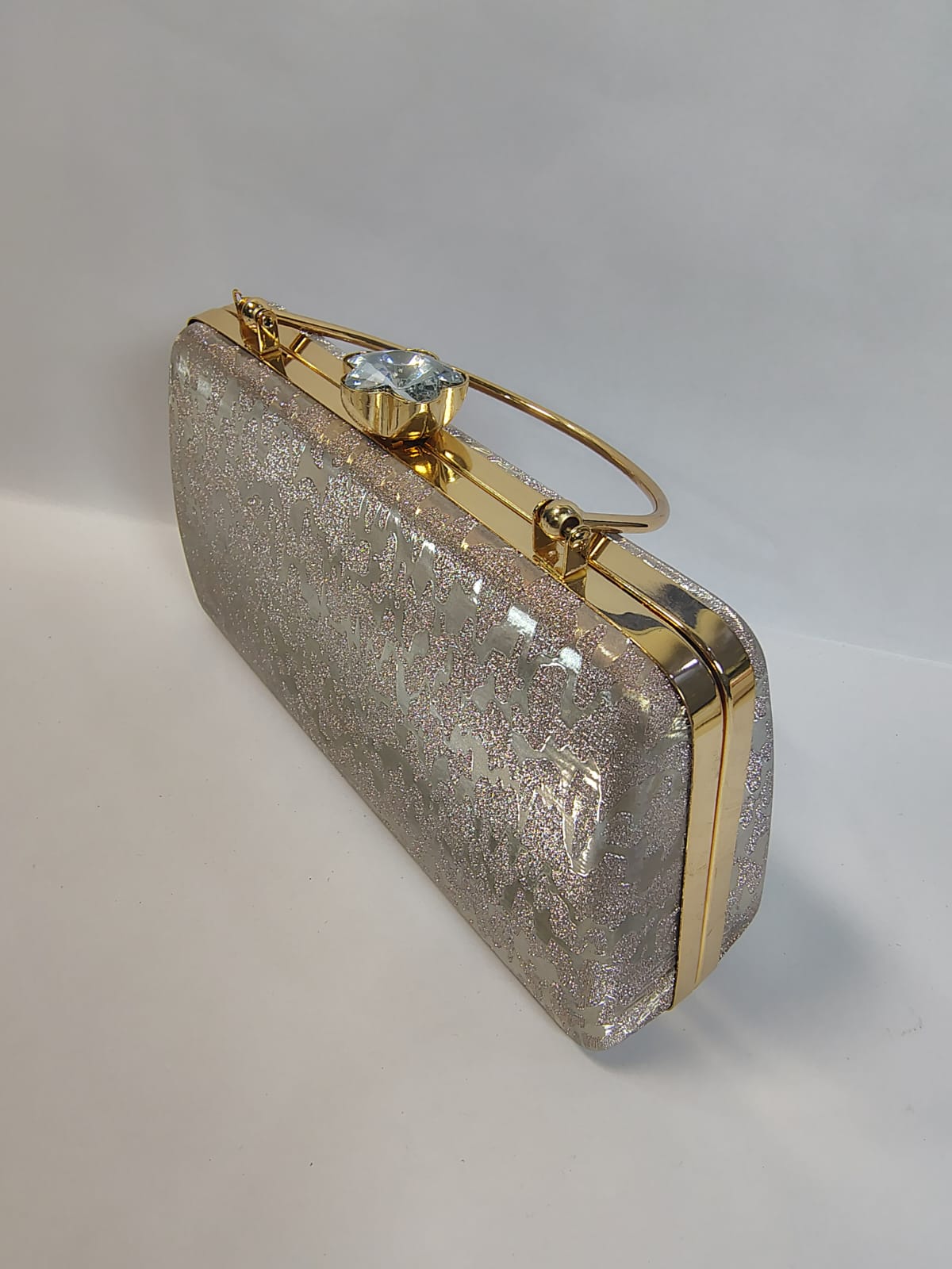 Wincham Fashion House clutch gold bag with a stunning glitter finish and elegant handle