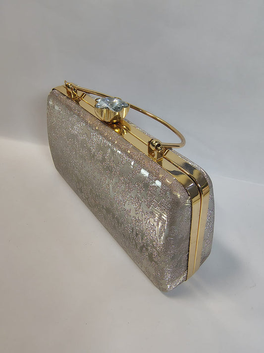 Wincham Fashion House clutch gold bag with a stunning glitter finish and elegant handle