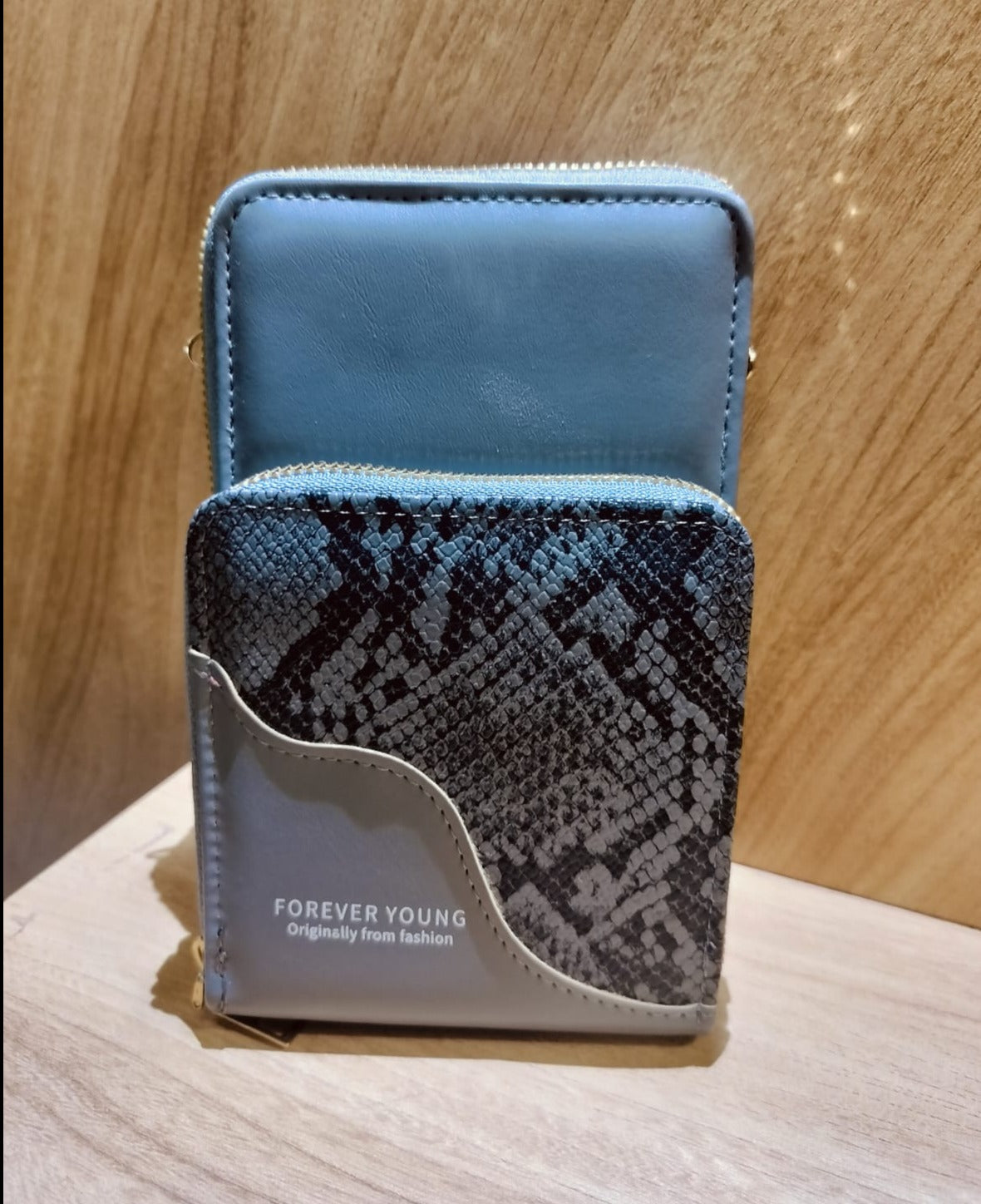 My Store mobile purse sling in gray with snake print front pocket and zipper closure