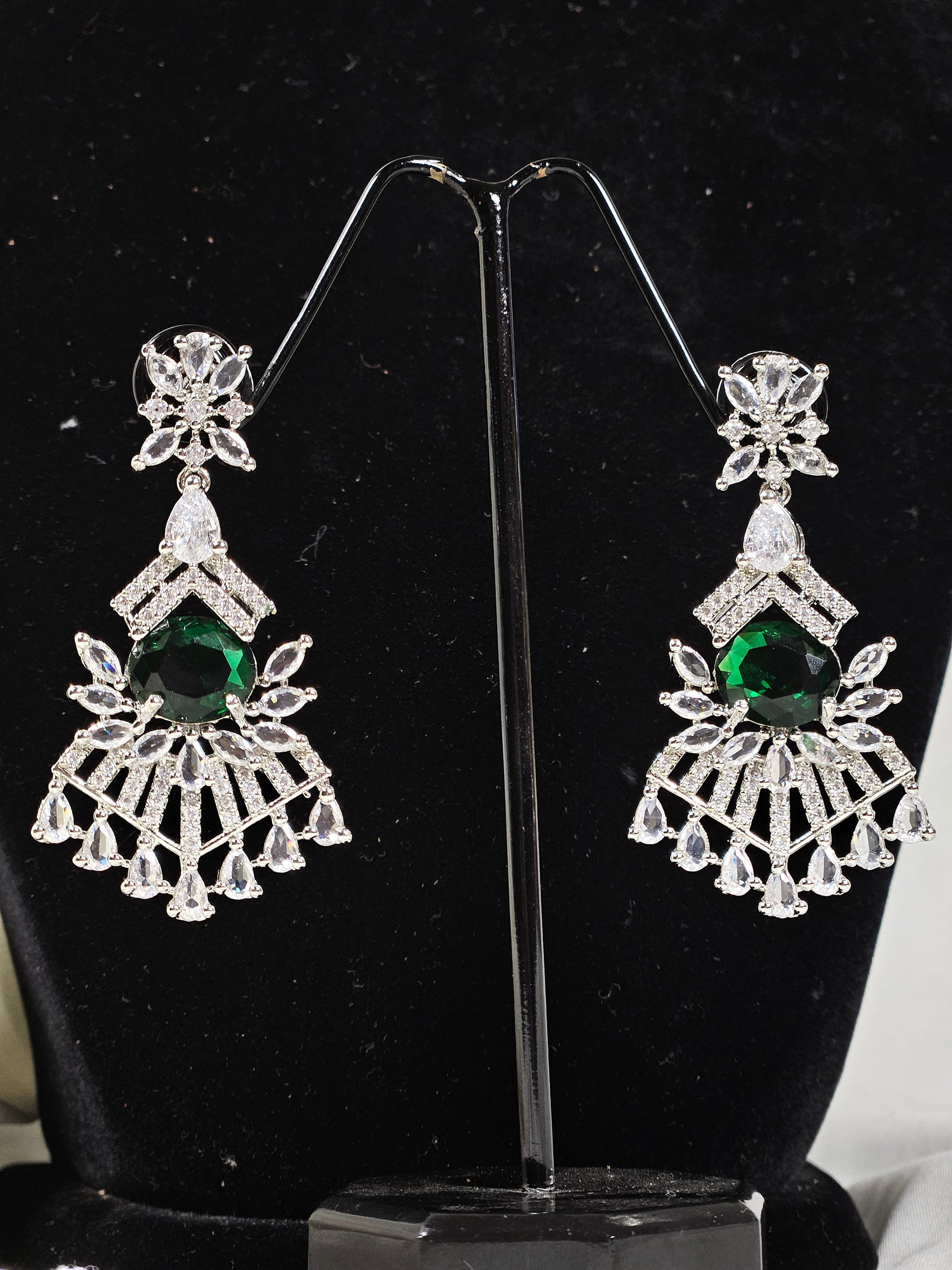 Wincham Fashion House Green AD stone necklace and earring set with intricate silver design and emerald green stones