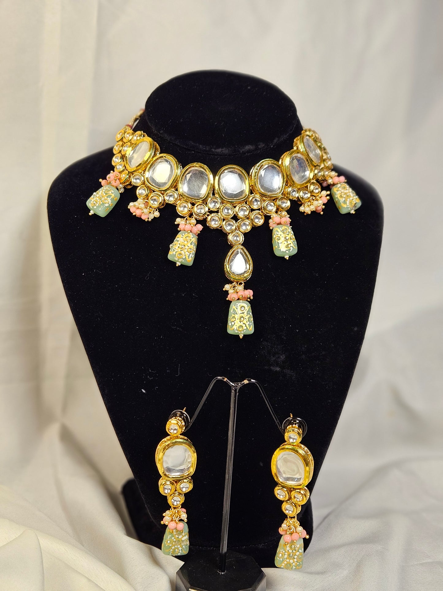 Wincham Fashion House Indian jewelry set featuring a stunning necklace and matching earrings with colorful stones