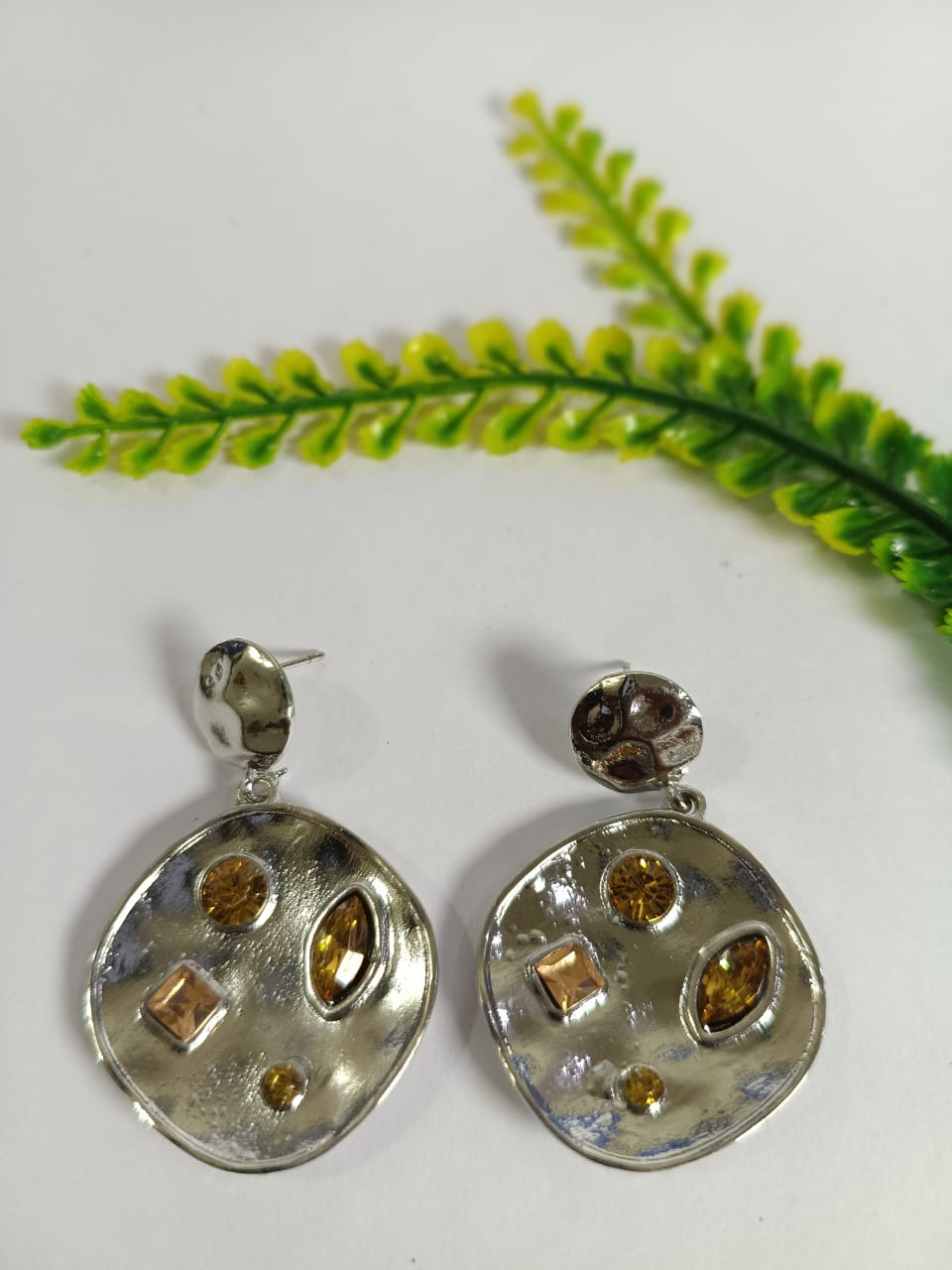 Wincham Fashion House earrings with stone beded drop featuring unique geometric design and metallic finish