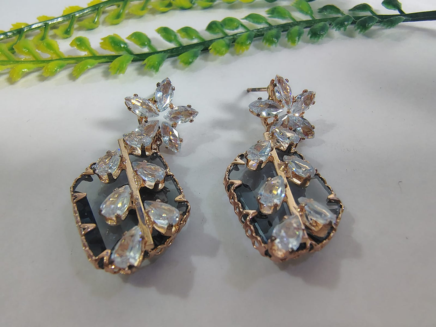 Wincham Fashion House stud diamond earrings with floral design and sparkling crystals
