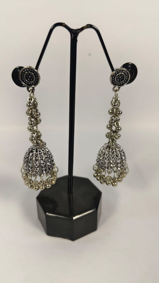 Oxidised silver dandiya jewellery earrings with intricate design and hanging elements for a traditional look