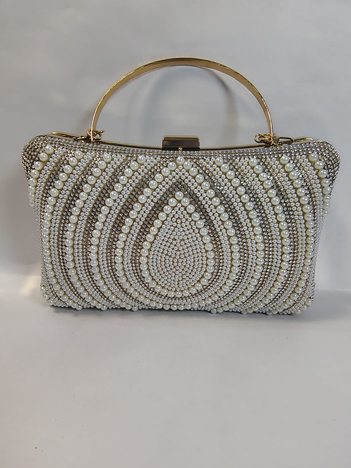 Wincham Fashion House pearl clutch it bag with intricate beading and elegant design