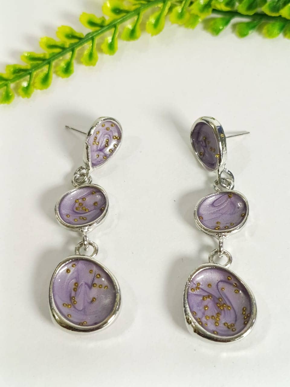 Elegant Wincham Fashion House earrings with stone drop featuring delicate purple stones and silver accents