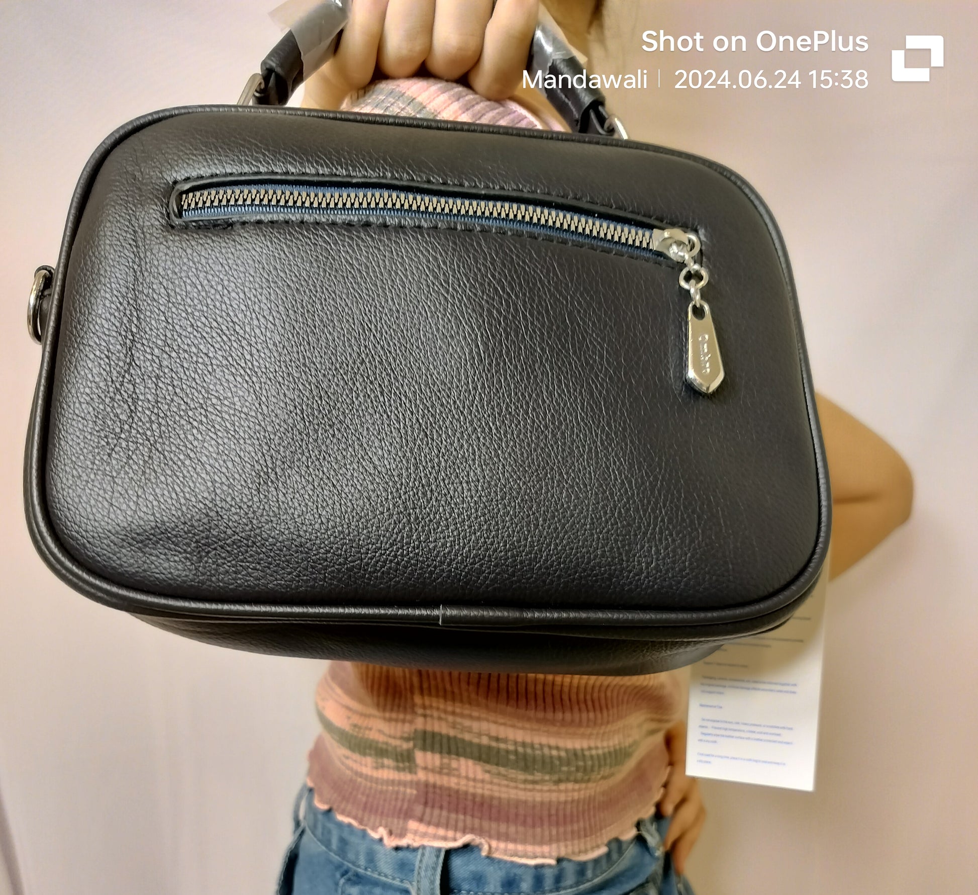 Wincham Fashion House stylish navy blue shoulder bag with zippered front pocket and smooth leather texture