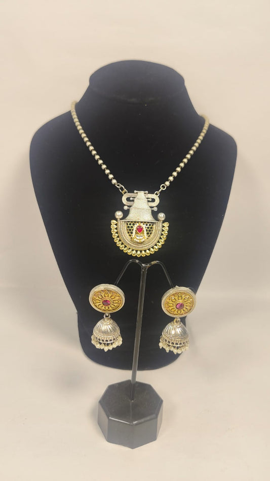 Temple necklace set with earrings featuring intricate designs and colorful accents