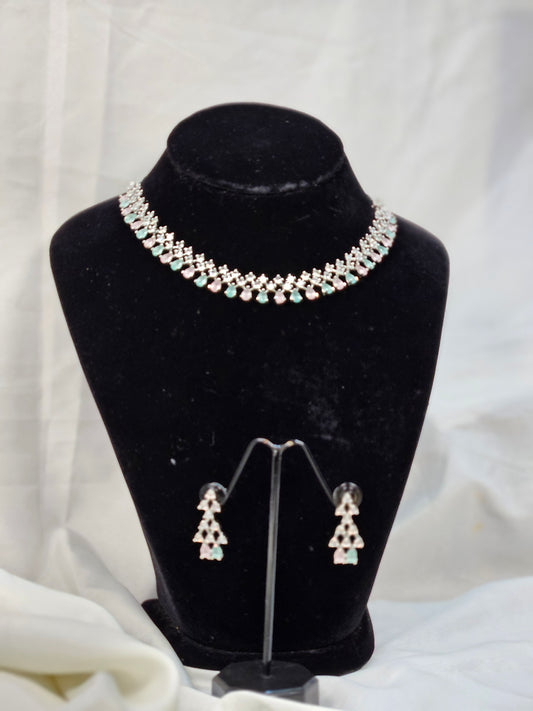 American diamond necklace set with matching earrings displayed