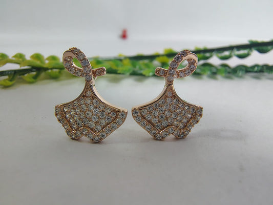 Elegant rose gold earrings with sparkling rhinestones, perfect to pair with women tops korean